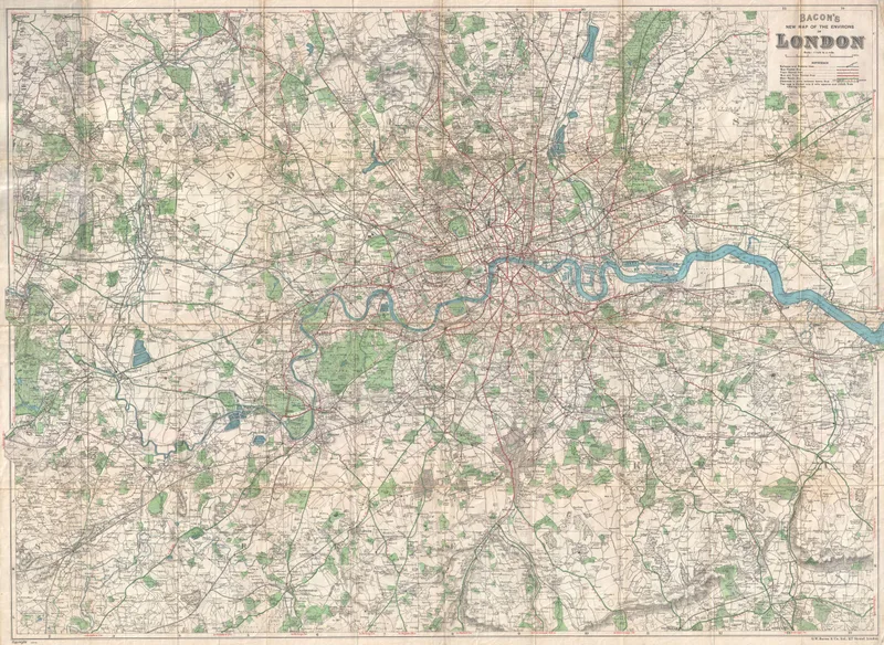 Bacon's 1920 map of the environs of London, a geographic street map showing roads, railways, parks and the Thames winding through the city.