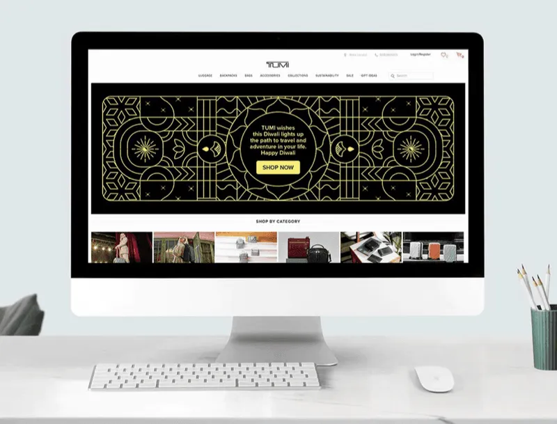 Desktop website mockup with a black and gold Diwali shopping banner
