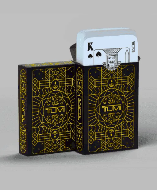 Finished TUMI playing-card gift boxes with gold patterned sleeves