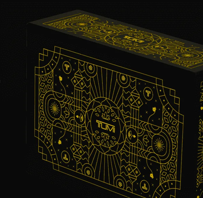 Close-up of a black TUMI gift box with gold Diwali patterns