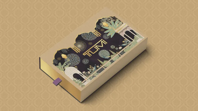 Early packaging concept with a black floral sleeve and cream tray