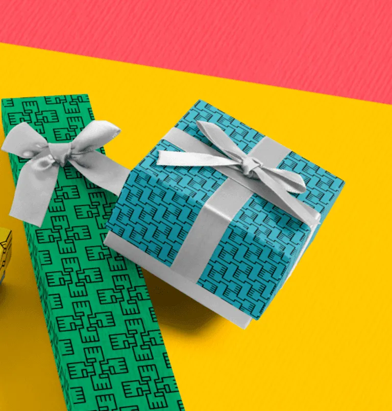 Gift-wrapped campaign stationery using the fellowship’s repeating symbol patterns